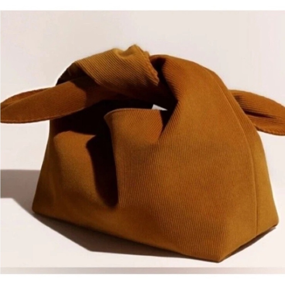 Corduroy Merit Cosmetic Bag with Soft Texture and
Slouchy Design